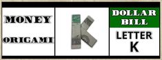 dollar bill origami letter k and dollar bill on white paper with green lettering