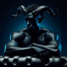 a man with horns on his head is sitting in a leather chair and looking at the camera