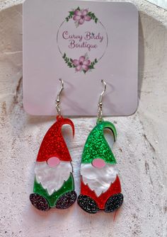 This item is in stock and ready for shipment! Its also available for local pick up in Magnolia, TX. Spend more than $99 dollars and shipping is on me! Add a festive touch to your holiday style with these adorable Christmas Gnome Earrings! Perfect for spreading cheer, these playful accessories are a must-have for the season. Approximately 2.5” long. Gnome Faux Leather Earrings, Gnome Earrings Diy, Gnomes Earrings, Gnome Earrings, Christmas Bucket List, Christmas Bucket, Earrings Acrylic, Gnome Christmas, Glitter Earrings