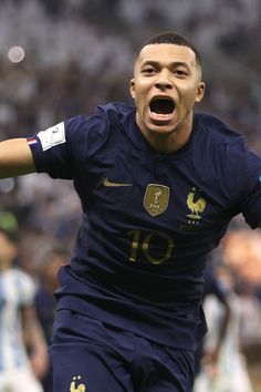 a soccer player with his mouth wide open