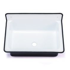 a black and white sink on a white surface