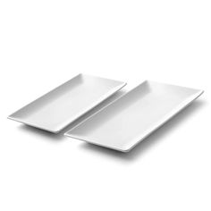 two white plates sitting on top of each other