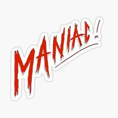 the word mania written in red ink on a white sticker with an arrow pointing to it