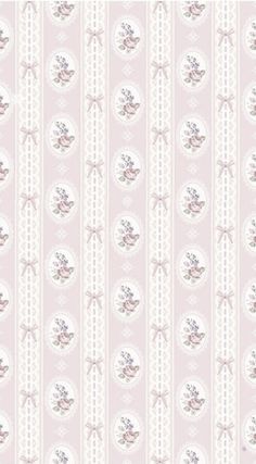 a pink and white striped wallpaper with flowers