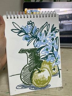 a drawing of flowers and an apple in a vase