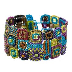 a multicolored beaded bracelet is shown on a white background and has beads in the shape of squares