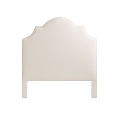 a white headboard with an arch design on it's sides and two legs