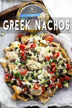 greek nachos with tomatoes, cucumber, olives and feta cheese