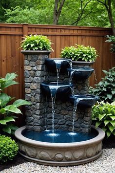 a water fountain in the middle of a garden