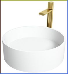 a white sink with a gold faucet on the side and a blue border around it