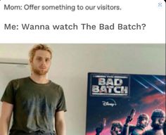 a man standing in front of a poster with the caption'me wanna watch the bad batch? '