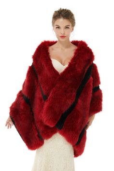 a woman is wearing a red fur coat