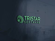 the logo for tristar software is shown in this dark room with chairs and desks