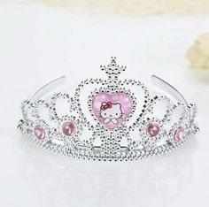 a hello kitty tiara with pink stones