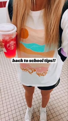 a girl with long hair holding a drink in her hand and the words back to school tips