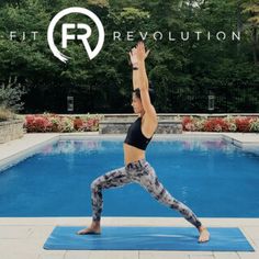 a woman doing yoga in front of a swimming pool with the fit revolution logo above her