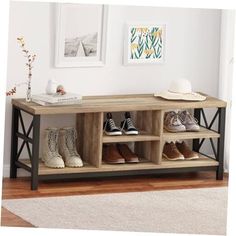 a wooden bench with shoes on it in a room