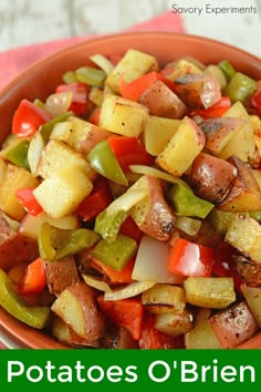 a bowl filled with potatoes and green peppers