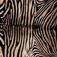 an animal print fabric with black and white stripes