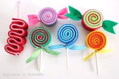 colorful lollipops are on top of each other