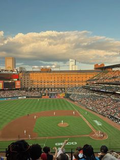 a baseball stadium filled with lots of people