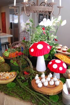 a table topped with lots of food and mushrooms