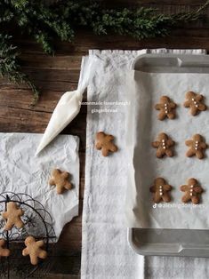 some cookies are sitting on top of white paper