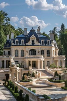 a large mansion with many steps leading up to it