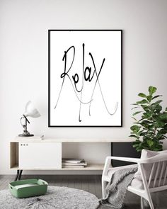 a black and white poster with the word relax in cursive writing on it