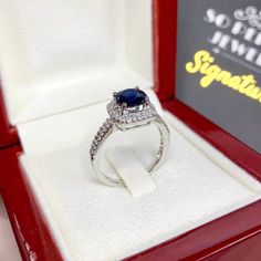 IN STOCK, READY FOR SHIPPING! 2-DAY UPS EXPRESS (free shipping). ENJOY OUR WORRY-FREE SERVICE AND THE DAZZLING, GENUINE JEWELRY WE DESIGN AND HANDCRAFT WITH LOVE❤️ ABOUT THE ITEM: BRAND-NEW!! ONE OF A KIND, HANDCRAFTED RING. EXTREMELY STUNNING! 1.95 carats Certified HEATED, BLUE SAPPHIRE ring. This ring offers an important statement of who you are with a 1.45 carats, DARK BLUE, transparent, cushion SAPPHIRE. Accentuating the sapphire are the 52 F/VS, and sparkling natural diamonds! Set in single Formal Sapphire Halo Ring Cushion Cut, Formal Cushion Cut Sapphire Halo Ring, Formal Sapphire Cushion Cut Halo Ring, Luxury Sapphire Cluster Ring With Halo Setting, Luxury 14k White Gold Halo Ring As Gift, Luxury Gia Certified Halo Ring For Anniversary, Formal Sapphire Ring With Radiant Halo Setting, Formal Sapphire Ring With Radiant Cut And Halo Setting, Formal Radiant Cut Sapphire Ring With Halo Setting