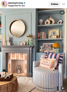 a living room filled with furniture and a fire place