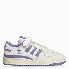 Low trainer from adidas Originals featuring a white and lilac perforated leather upper, lace-up and Velcro fastening, contrasting interior, rounded toe, logo print on the side and rubber sole. Purple Adidas Shoes, Lilac Sneakers, Cute Adidas Shoes, Red Trainers, Velcro Shoes, Vegan Sneakers, Pretty Shoes Sneakers, White Lilac, Shoe Wishlist