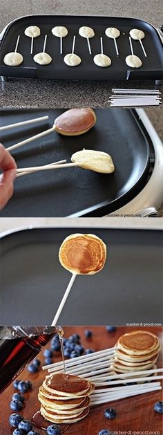 pancakes being cooked on a grill with blueberries and syrup pouring over them to cool off