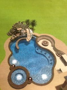 an aerial view of a swimming pool in the middle of a yard