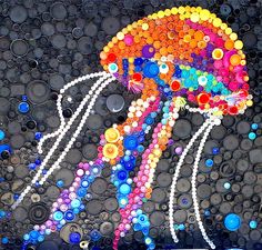 an image of a colorful jellyfish made out of bottle caps