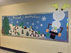 a bulletin board is decorated with penguins and snowmen in the background, along with an image of a school's snowman