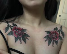 a woman's chest with flowers on it