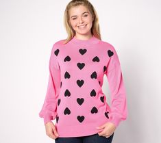 What a lovely sweater! Balloon sleeves, a mock turtleneck, and a heart design make this sweater a must-have for any occasion. From Belle by Kim Gravel. Cute Heart Graphic Sweater For Fall, Trendy Long Sleeve Sweater For Valentine's Day, Trendy Long Sleeve Valentine's Day Sweater, Trendy Heart Print Sweater For Valentine's Day, Trendy Valentine's Day Sweater With Heart Print, Trendy Heart-shaped Valentine's Day Sweater, Trendy Valentine's Day Sweater With Heart Graphic, Intarsia Sweater, Kim Gravel