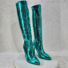 Green Metallic Festive Pointy Toe With Inseam Side Zipper Snake Skin Textured 4 Inch Stiletto Heel Brand New In Box. Green Closed Toe Party Boots, Green Knee-high Heeled Boots For Party, Trendy Green Heeled Boots For Party, Chic Green Heeled Boots For Party, Elegant Green Heeled Boots For Party, Elegant Green Boots For Party, Green High Heeled Boots For Party, Green Fitted Heeled Boots For Party, Fitted Green Heeled Boots For Party