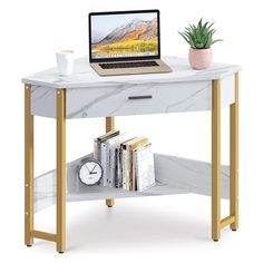 a laptop computer sitting on top of a white desk next to a shelf with books