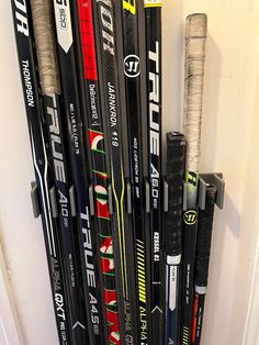 there are many different types of skis on the wall