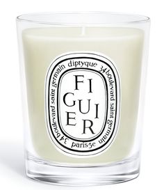 a candle that is sitting in front of a white background with the words figuer on it