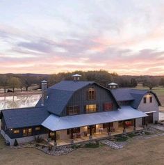 an aerial view of a large house in the country