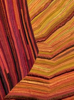 an image of multicolored rugs that are very unique to see in this photo