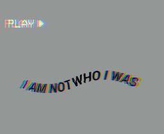 the words i am not who i was written in multicolored letters on a gray background