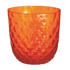 an orange glass bowl is shown against a white background