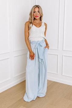 - Go with this flow in these trendy pants! - Unlined chambray material - A waistline with an elastic back, belt loops, and a removable tie closure belt - Pleated details on front - Functional side pockets - A relaxed silhouette that ends in wide floor length hemlines Chambray Pants, Trendy Pants, Concert Fashion, Babydoll Blouse, Wedge Loafers, Long Sweater Dress, Swimwear Dress, Sparkly Dress, Black Dresses Casual