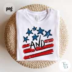 a t - shirt with an american flag and stars on the front is sitting on a wicker basket