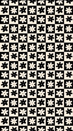 a black and white checkered pattern with flowers