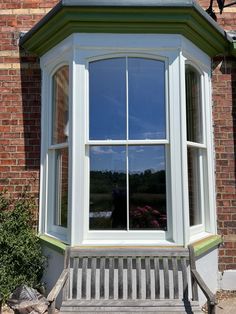 Exterior of a sliding sash bay window in a Victorian house. Sash Window, Timber Windows, Bay Windows, Sash Windows, Bay Window, Summer Sun, Green Bay, Joinery, Lime Green